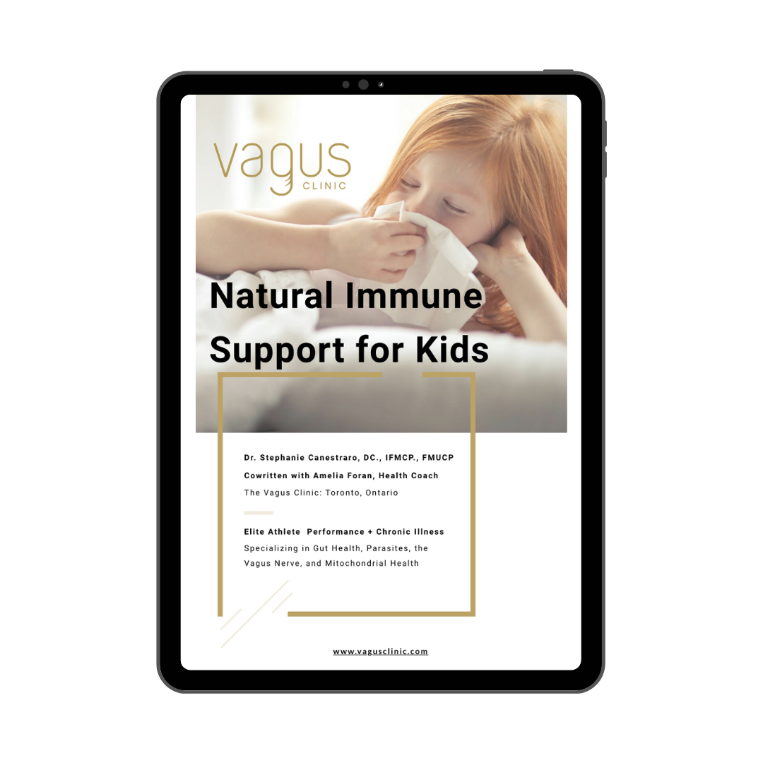 A digital tablet displaying a cover of a guide titled 'Natural Immune Support for Kids' with an image of a child blowing their nose.