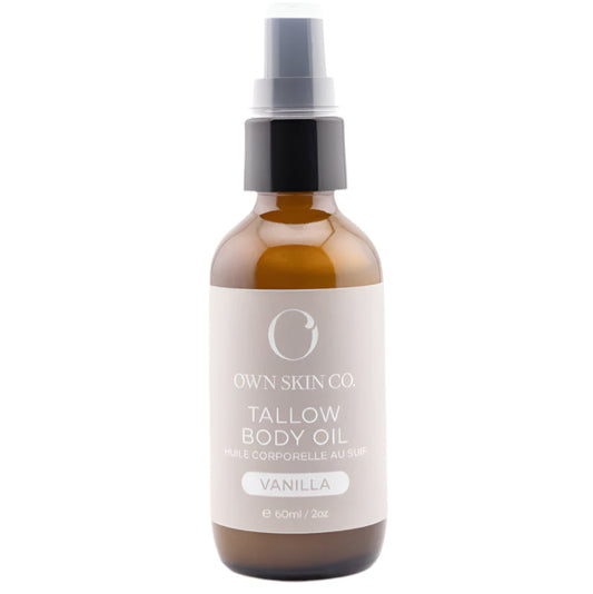 Bottle of tallow body oil with vanilla fragrance on a white background