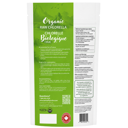 Back view of a white stand-up pouch of organic raw chlorella with a green side panel showing product details, ingredients, and a Canadian maple leaf logo.
